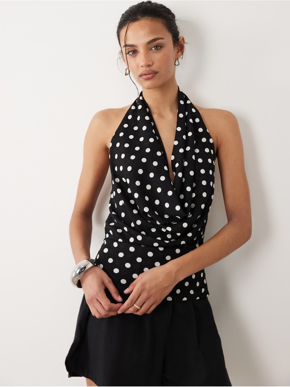 Mango halter cowl neck top in black and white polka dot print